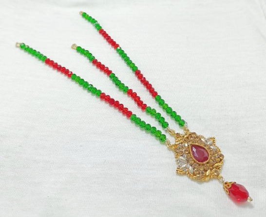 Casting Matha Patti for Women with Green and Red Stones Golden